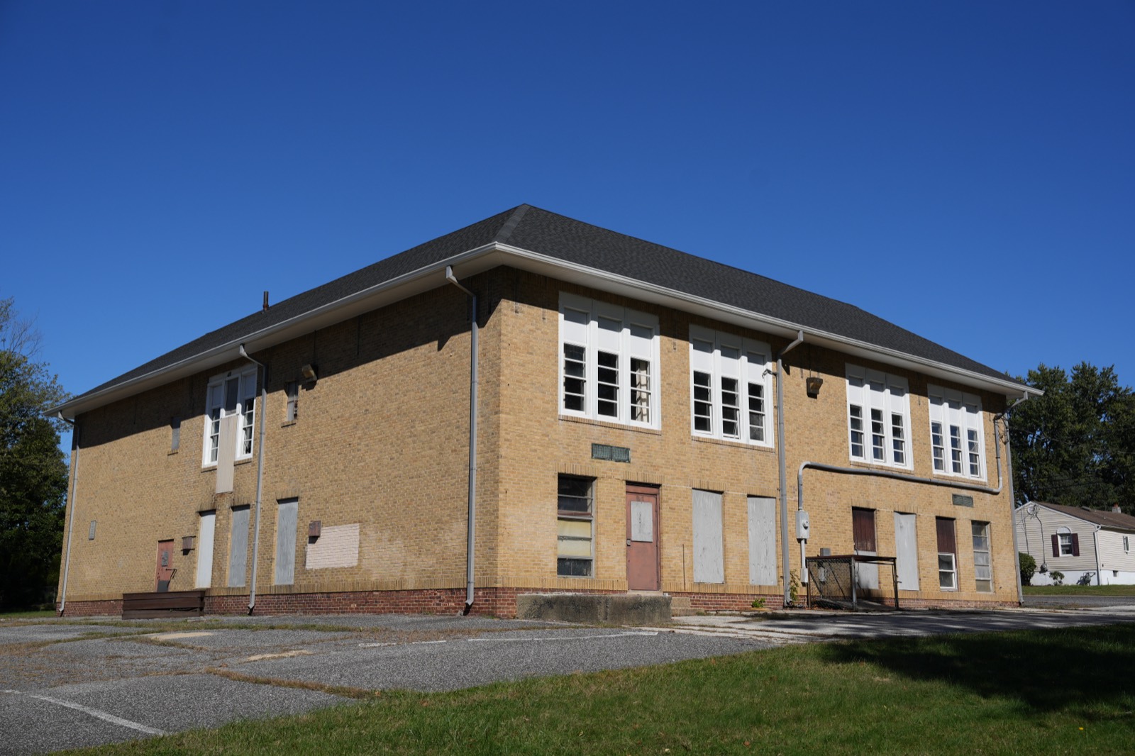 The side of the building, with its rows of tall windows